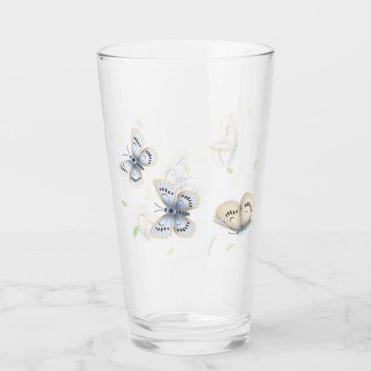 飛行かわいらし中の青とクリームの蝶 タンブラーグラス (正面)