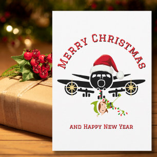 飛行機のサンタ帽子とエルフのカスタムクリスマスフォト シーズンカード