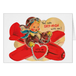 飛行機のバレンタインメッセージカードを持つヴィンテージの男の子