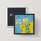 飛行機の蝶を取る 缶バッジ (正面&裏面)