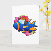 飛行機を操縦するペンギン カード (黄色い花)