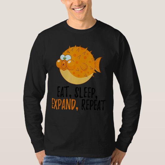 食べ寝る、拡大する、繰り返すフグ Tシャツ (正面)