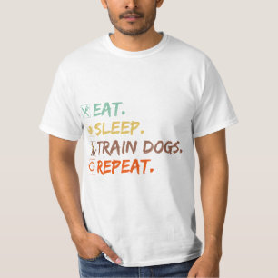 食べ犬の訓練を繰り返すおもしろい Tシャツ