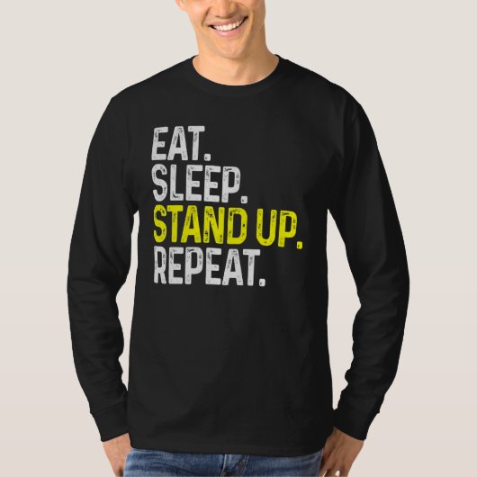 食べ眠りスタンドアップおもしろいスタンドアップ喜劇 Tシャツ (正面)