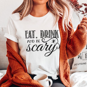 飲み物を食べて下さい及び恐いハローウィンパーティの黒及び白があって Tシャツ