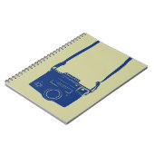 首の革紐のノートが付いているヴィンテージのフィルムのカメラ ノートブック (左側)