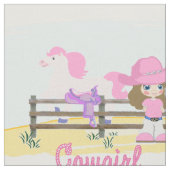 馬およびサドルの生地を持つ小さい女性のカーボーイ ファブリック (クローズアップ)