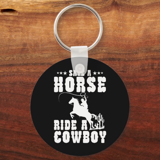 馬がカウボーイの馬に乗っおもしろいて男性に乗るのを除く キーホルダー (正面)