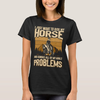 馬に乗ってすべてのものを無視したいだけ Tシャツ