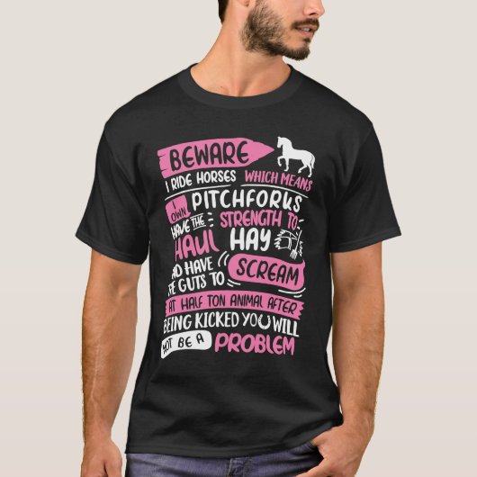 馬に乗ってます 気をつけてね 馬に乗るのは問題じゃない Tシャツ (正面)
