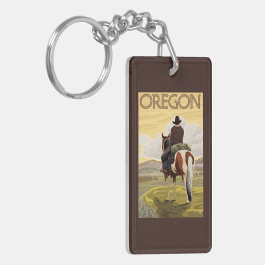 馬の背のヴィンテージ旅行ポスターのカウボーイ キーホルダー (正面左)