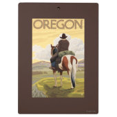 馬の背のヴィンテージ旅行ポスターのカウボーイ クリップボード (裏面)