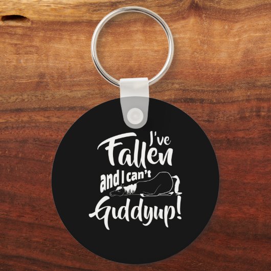 馬落ちたに乗って目が回おもしろいらない キーホルダー (正面)