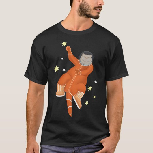 駅の中のオレンジ色の宇宙飛行士 Tシャツ (正面)