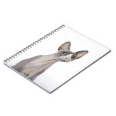 驚きの表情をしたオオヤマネコ ノートブック (左側)