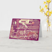 骸骨が自転車に乗ってハロウィンを楽しむ カード (黄色い花)