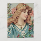 髪ビクトリアンにピンクと青の花を付けた女性 ポストカード (正面)