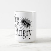 魅力的しかし怒て小さな悪魔の猫のおもしろい引用文 コーヒーマグカップ (中央)