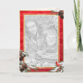 魅力的な（鳥）ショウジョウコウカンチョウと赤いサテンの松の実 シーズンカード