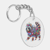 魅惑された白熱［赤熱］光を放つラクーン キーホルダー (正面左)