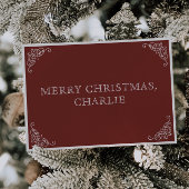 魅惑的な赤いサンタクロースのクリスマスデーの手紙