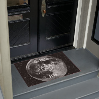 魔女が入っている ドアマット
