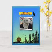 魔女とハロウィーンのカボチャのちょうちんの飛んでいる仮面 カード (黄色い花)