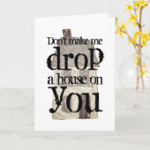 魔女の上に家を落とすなおもしろいい カード (黄色い花)