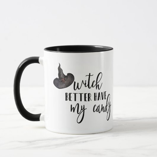 魔女は私のキャンディマグを持っている方がよい マグカップ (左)