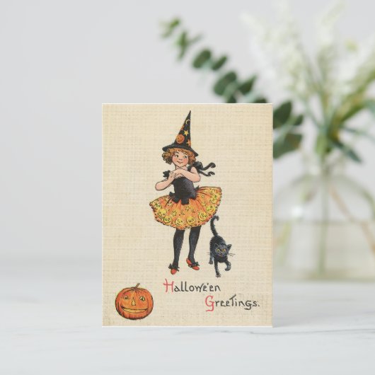 魔女ハロウィーンの衣装を着た小さな女の子、黒猫。 ポストカード (スタンド正面)