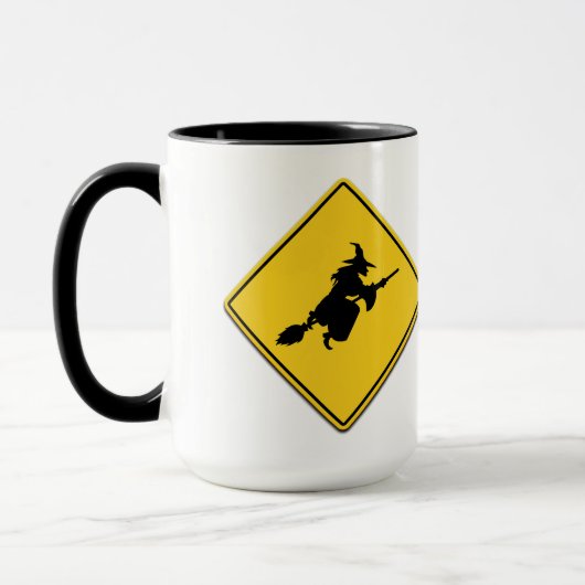 魔女警告の マグカップ (左)