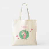 魔法のユニコーンピンクとティール(緑がかった色)の名前ガール トートバッグ (裏面)