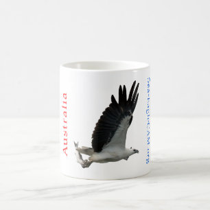 魚のマグを持つ海ワシ コーヒーマグカップ