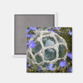 魚釣りが花の間で浮く マグネット (正面/裏面)