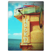 魚釣りのhook'dのビーチの魚の釣り道具箱の水 クリップボード (裏面)