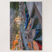 魚釣りボートは湖のリヴァデルガルダイタリア ジグソーパズル (縦)