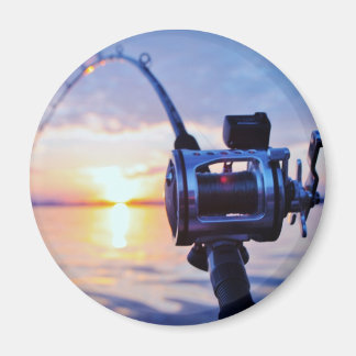 魚釣りリールを夕日に マグネット