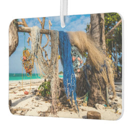 魚釣り網がビーチ上で乾燥 カーエアーフレッシュナー