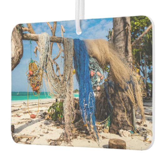 魚釣り網がビーチ上で乾燥 カーエアーフレッシュナー (左)