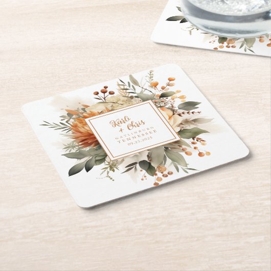 鮮やかなオレンジ色の秋の花と緑 スクエアペーパーコースター (アングル)