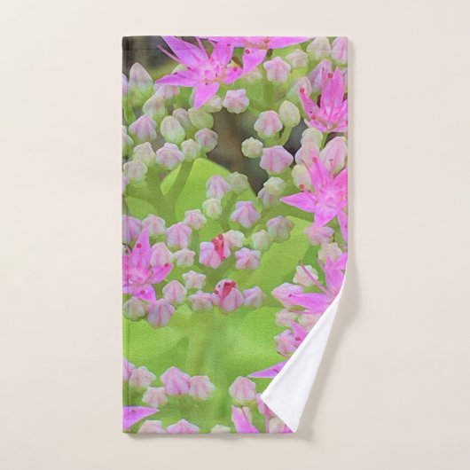 鮮やかなピンクの多肉植物セダムと緑の肉厚な葉 ハンドタオル (ハンドタオル)