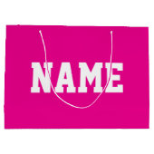 鮮やかなホットピンクに白いYOUR NAME ラージペーパーバッグ (裏面)