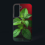 "鮮やかなミントプラントマクロ – ボタニカルグリーンの黒 SAMSUNG GALAXY S22ケース<br><div class="desc">ミント工場の鮮やかなマクロ写真を使って、宇宙に新鮮さと自然の優雅さを感じながら。詳細で素晴らし捉えられ離れた鮮明な緑のポップ・アートのは目に見える赤いグラディエントで、不機嫌な黒い背景に対して劇的に。キッチンの装飾、ハーブをテーマにした贈り物、植物愛好家、または自然の生の美しいを鑑賞する人に最適。このデザインは、プリント、マグカップ、トートバッグ、またはエコ意識のアクセサリーに最適である。</div>