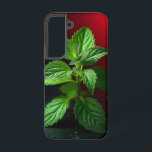 "鮮やかなミントプラントマクロ – ボタニカルグリーンの黒 SAMSUNG GALAXY S22ケース<br><div class="desc">ミント工場の鮮やかなマクロ写真を使って、宇宙に新鮮さと自然の優雅さを感じながら。詳細で素晴らし捉えられ離れた鮮明な緑のポップ・アートのは目に見える赤いグラディエントで、不機嫌な黒い背景に対して劇的に。キッチンの装飾、ハーブをテーマにした贈り物、植物愛好家、または自然の生の美しいを鑑賞する人に最適。このデザインは、プリント、マグカップ、トートバッグ、またはエコ意識のアクセサリーに最適である。</div>