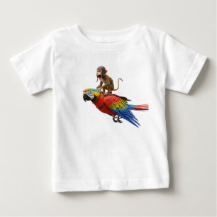鮮やかなルビーコンゴウインコに乗ったおもしろサルパイロット ベビーTシャツ