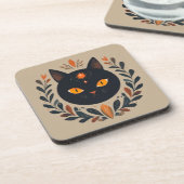 鮮やかな目をした黒猫のイラスト コースター (左側)