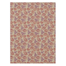 鮮やかな赤と紫の葉のモチーフがニュートラルなベージュに映える