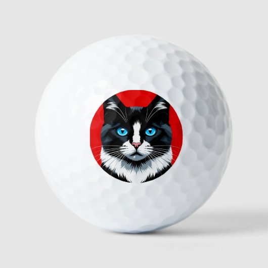 鮮やかな青い目をした黒白の猫 ゴルフボール (正面)