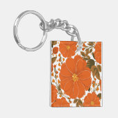 鮮やかオレンジの花のパタ離れーン キーホルダー (正面左)