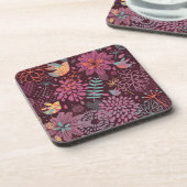 鳥が付いている抽象的な花パターン コースター (左側)